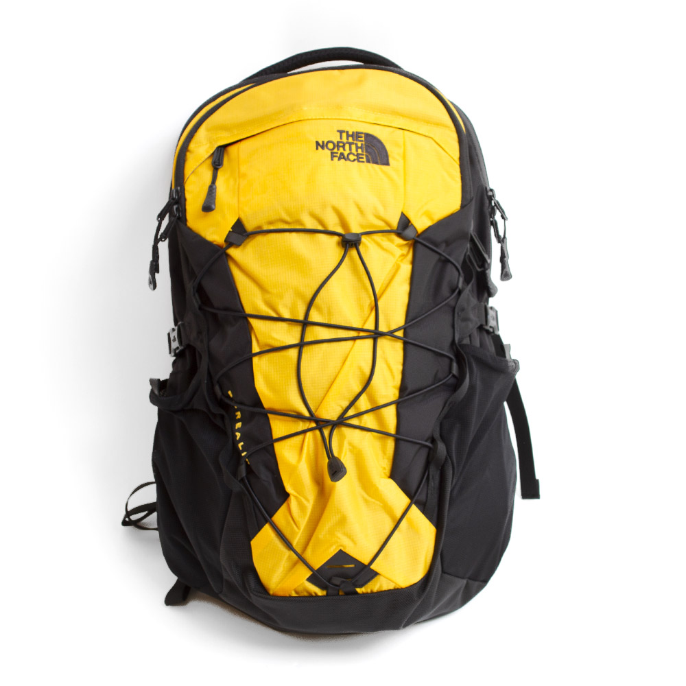 black and yellow north face backpack